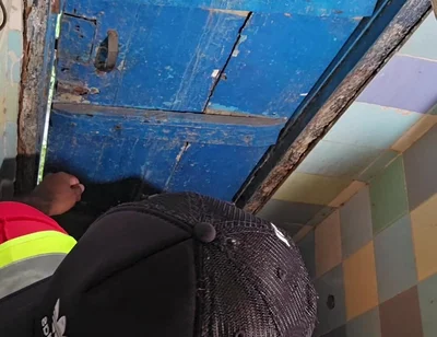 Two Construction Workers Making Out in the Company Bathroom.