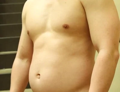 Flexing by the Stairs at the Gym