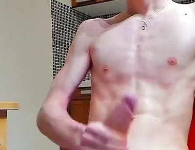 A young beautiful gay twink fucks a vibrator