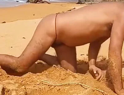 Ladysilva on the Beach Showing off His Hot Ass in Red Panties